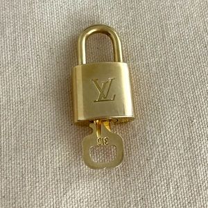 #316 Louis Vuitton Brass Lock and Key Set